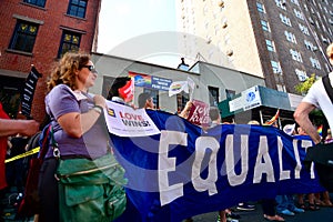 People celebrating gay marriage rights at Stonewall Inn New york