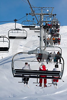 People on a chairlift, ski resort photo