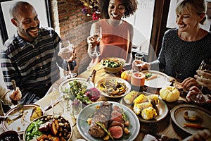 People Cheers Celebrating Thanksgiving Holiday Concept photo