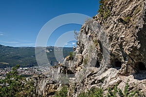 People Climbing Mountain by Mandrin Caves