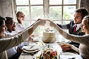 People Cling Wine Glasses on Wedding Reception with Bride and Gr