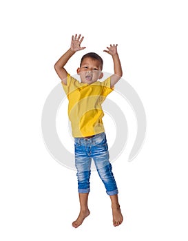 People concept happy little asian boy jumping in air happiness, childhood, freedom in movement isolated on white