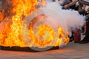 People in the conflagration preventive extinguisher training pro