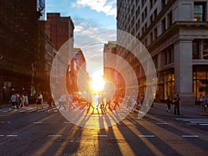 People cross busy intersection on 23rd Street in Manhattan New York City photo