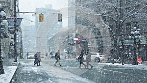 People Cross City Road In Snowstorm