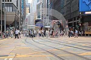People crossed the Des Voeux Road Central at busy hour 18 May 2021