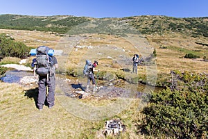 People crossing river.