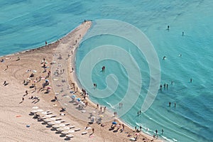 People crowd on the beach, top view