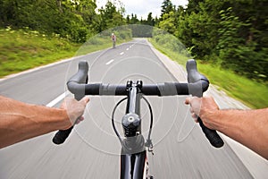 People cycling on the road in nature