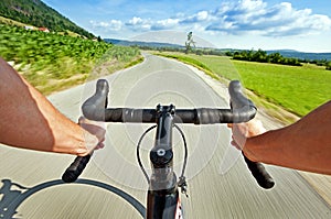 People cycling on the road in nature