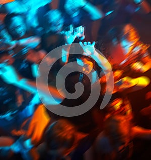 People dancing in a bar or nightclub at a party photo