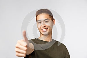 People, different expressions and lifestyle concept. Great idea, nice work. Portrait of enthusiastic asian male student