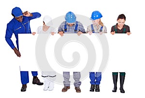 People with diverse professions holding placard