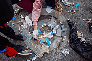 People doing a beach clean-up, community initiative to gather trash