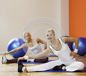 People doing stretching exercise