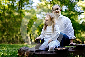 People with down syndrome happy outdoors