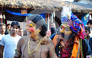 People dressed up as mythological characters in India