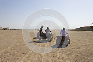 People driving fourwheelers in Hurghada desert