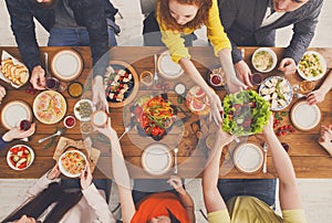 People eat healthy meals at served table dinner party