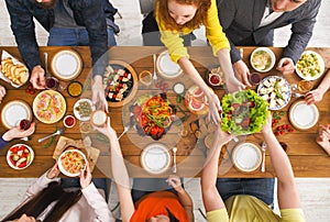 People eat healthy meals at served table dinner party