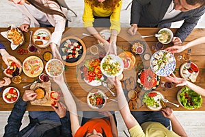 People eat healthy meals at served table dinner party