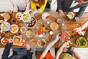 People eat healthy meals at served table dinner party