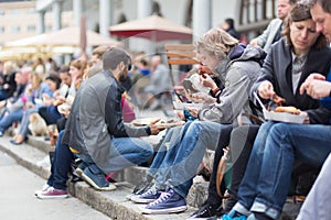 People enjoing outdoor street food festival in Ljubljana, Slovenia.