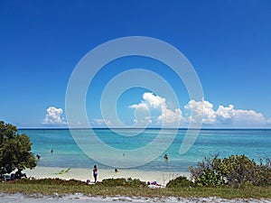 People enjoying the beach in Florida Keys
