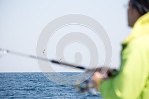 People enjoying boat fishing