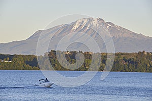 People enjoying and doing sports in the lake of Puerto Varas, Chile