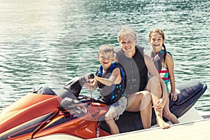 People enjoying a ride on a personal watercraft