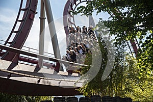 People enjoying a ride in the Tivoli Gardens Copenhagen