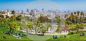 People enjoying sunny weather in Mission Dolores Park, San Francisco, USA photo