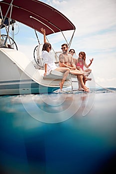 People enjoying traveling on the yacht