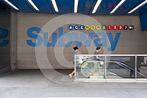 People entering a subway station in New York