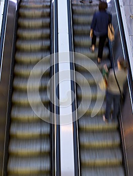 People on escalators photo