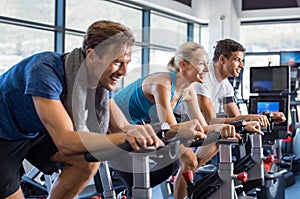 People on exercise bike