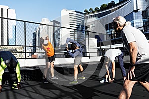 People exercising at fitness gym