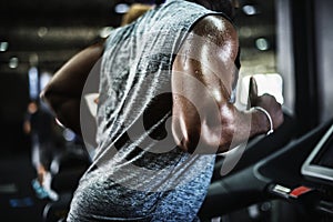 People exercising at fitness gym