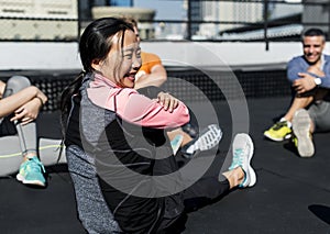 People exercising at fitness gym