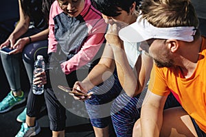 People exercising at fitness gym