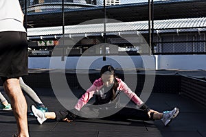 People exercising at fitness gym