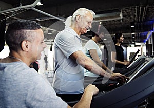 People exercising at fitness gym