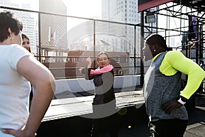 People exercising at fitness gym