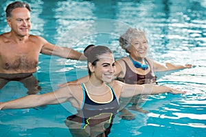 People exercising in pool