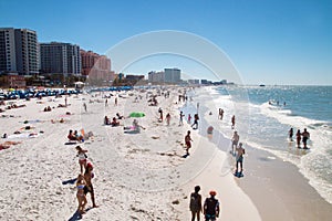 People at exotic sandy beach vacation, Clearwater beach Florida