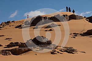 People in exploration sahara desert