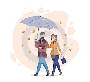 People in fall, enjoying autumn activity. Couple walking together with an umbrella in rain and falling autumn leaves.
