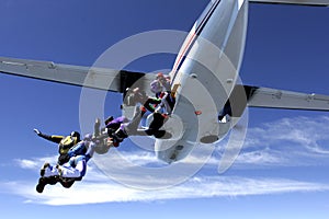People falling from airplane