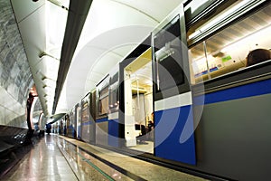 People in fast train in subway